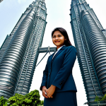데이터 증강 기법의 최적화 방법 - Businesswoman in Kuala Lumpur**

"A professional businesswoman in a modest, tailored suit, standing ...